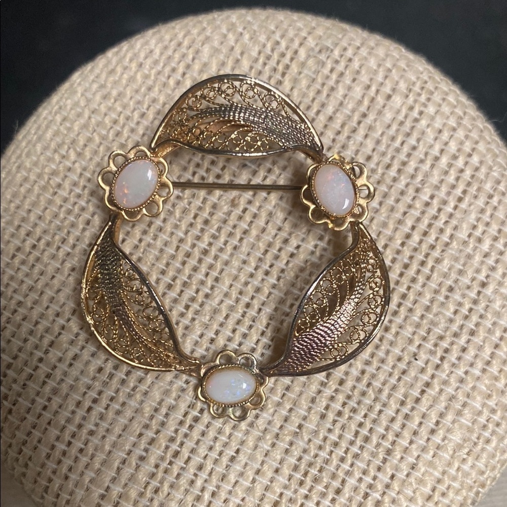 Gold and White Brooch